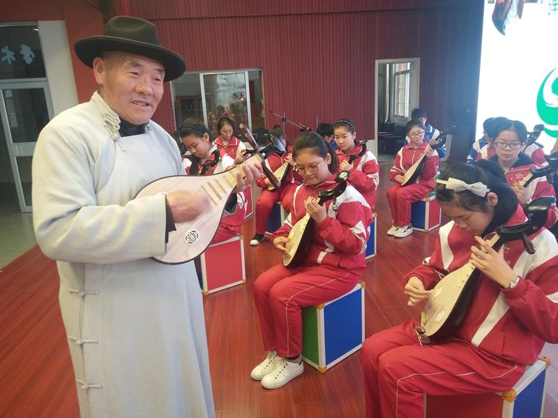 王广超：传承湖区文化  土琵琶进课堂